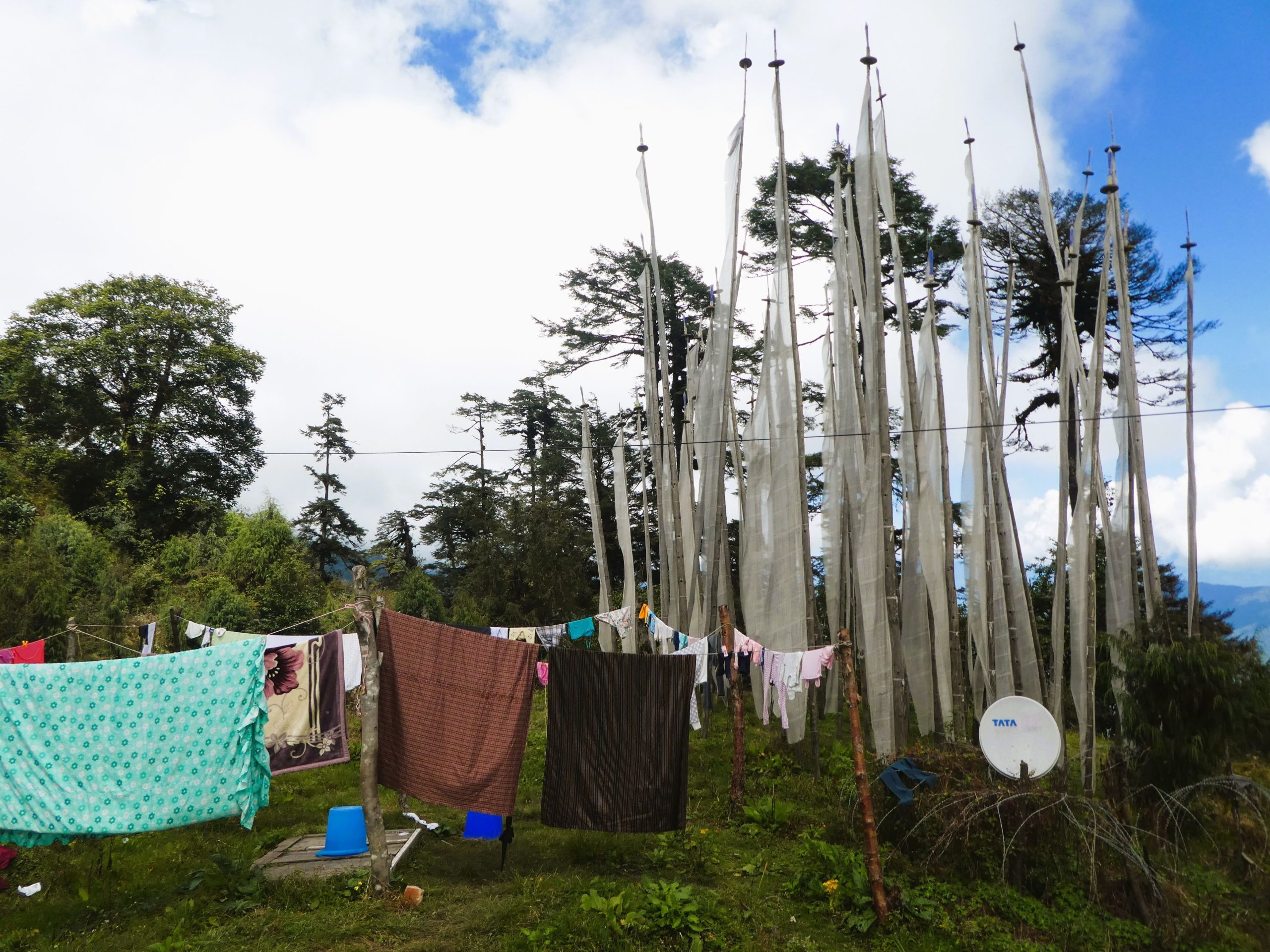 Death flags in the backyard of a home next to the washing line as a normal part of their life