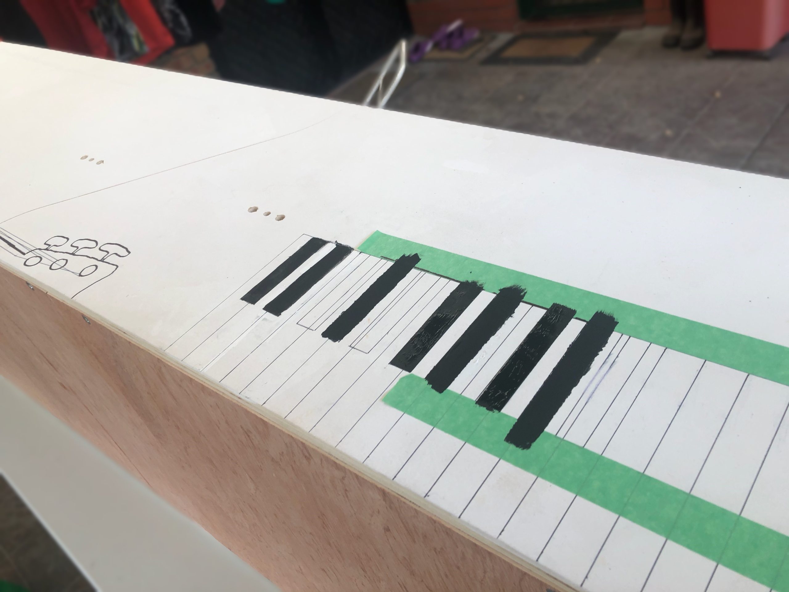 Jan painstakingly created a keyboard to correct measurements on the side of the eco-coffin