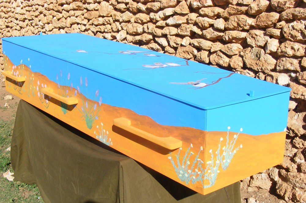 Decorated eco coffin in desert colours