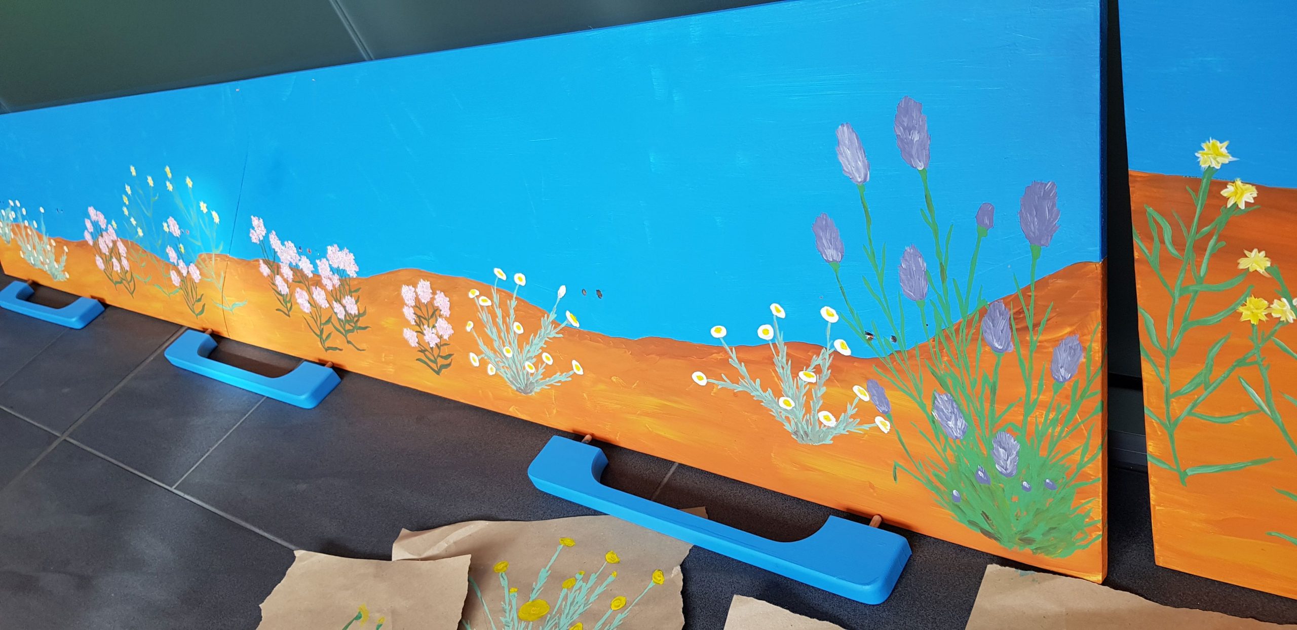 Desert plants painted on eco coffin side panels