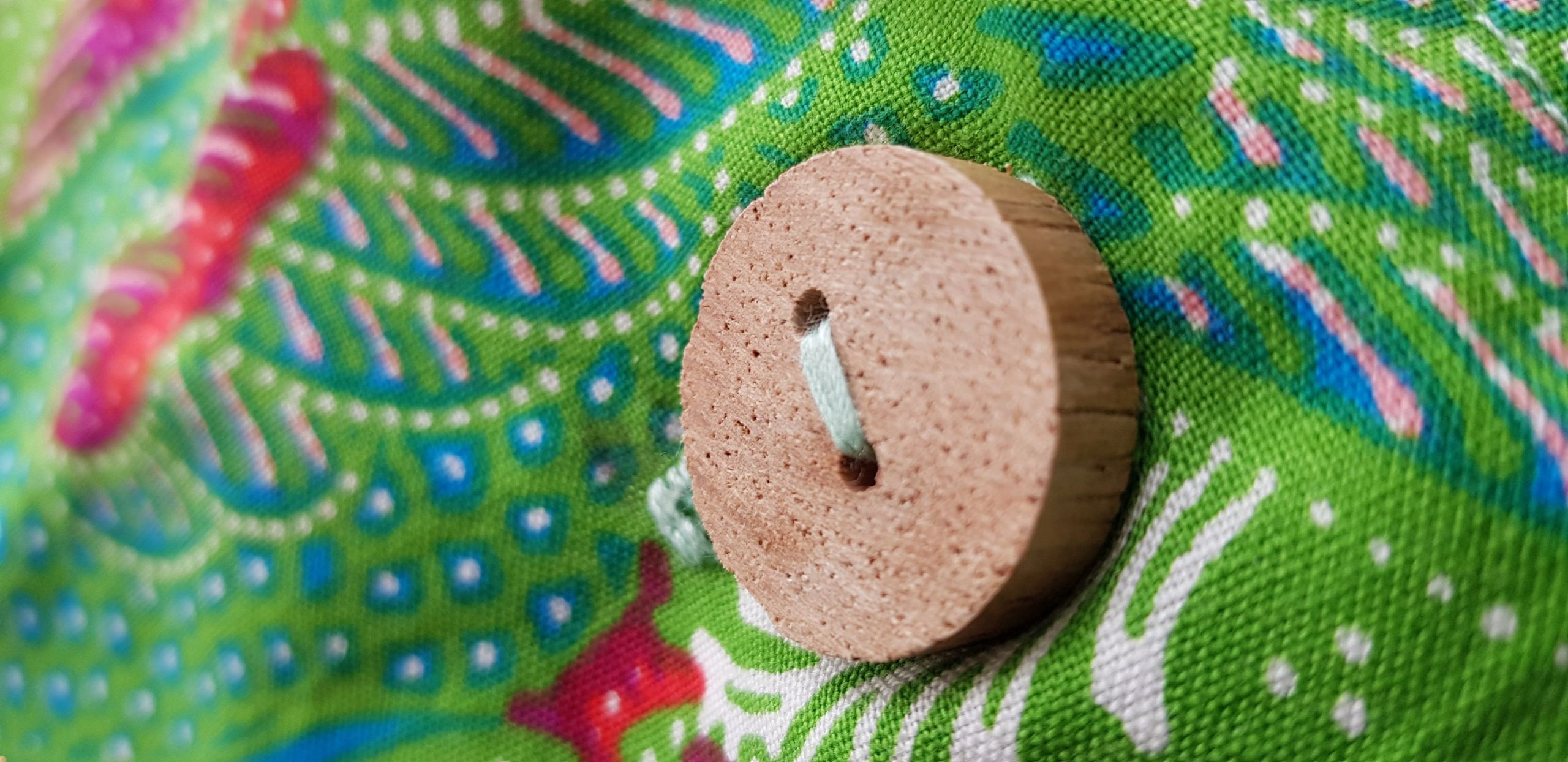 Shroud button make from a slice of the wood-handle from an old crab rake