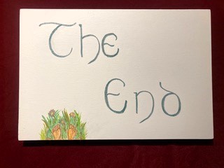 'The end' written on the panel at the end of the eco-coffin